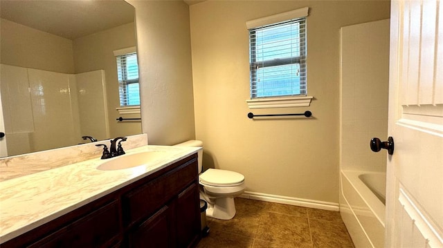 1328 Ridgeway Dr, Moore, OK 73160 - bathroom featuring vanity, healthy amount of natural light, tile patterned flooring, and washtub / shower combination