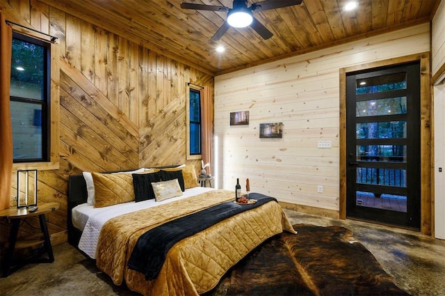 bedroom with wooden ceiling, wooden walls, concrete flooring, and recessed lighting