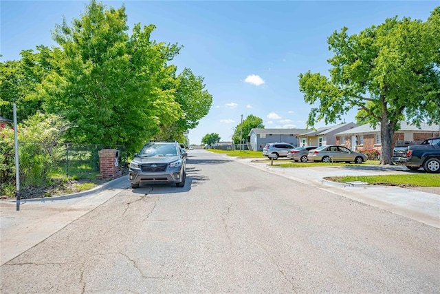 2717 SW 42nd St, Oklahoma City, OK 73119 - view of road with curbs and a residential view