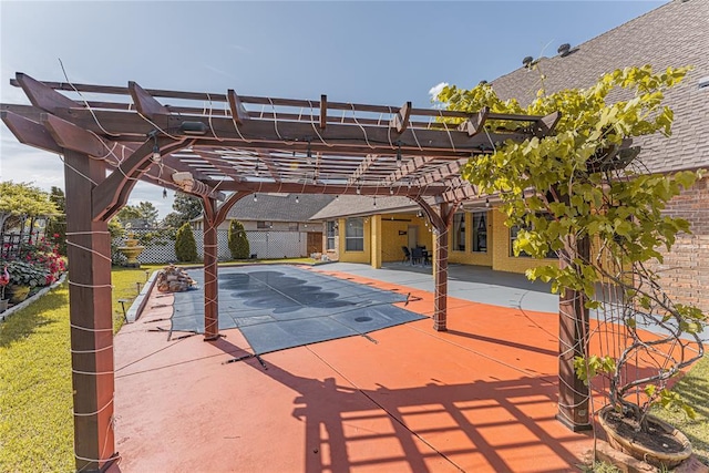 view of swimming pool featuring a patio area, a pergola, and fence
