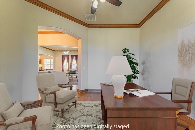 2612 SW 137th St, Oklahoma City, OK 73170 - office featuring a ceiling fan, arched walkways, wood finished floors, ornamental molding, and baseboards