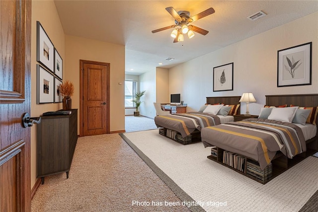 2612 SW 137th St, Oklahoma City, OK 73170 - bedroom with light carpet, baseboards, and ceiling fan