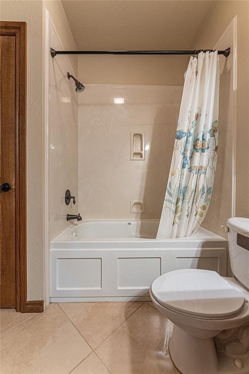 2612 SW 137th St, Oklahoma City, OK 73170 - bathroom featuring shower / bath combination with curtain, toilet, and tile patterned floors