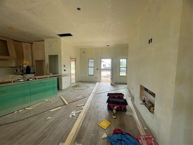 unfurnished living room featuring wood finished floors