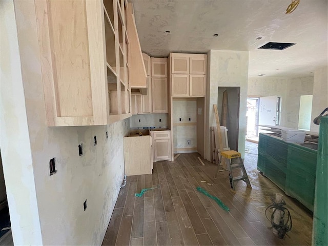 kitchen with dark wood finished floors