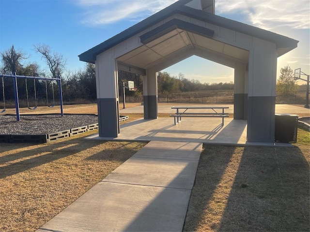 surrounding community featuring a playground and a gazebo