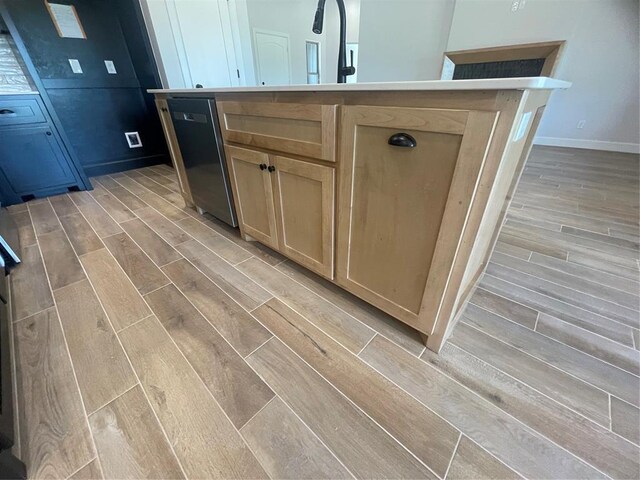 5012 Misty Wood Ln, Mustang, OK 73064 - detailed view of wood finished floors and dishwasher