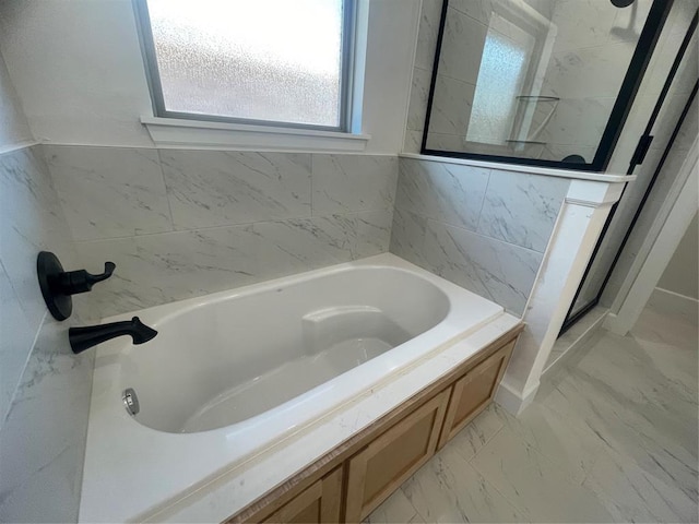 5012 Misty Wood Ln, Mustang, OK 73064 - full bath featuring a bath, marble finish flooring, and a shower