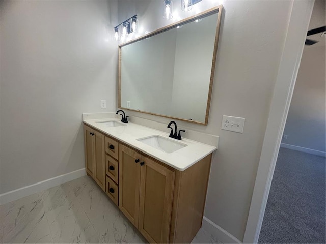 5012 Misty Wood Ln, Mustang, OK 73064 - bathroom with double vanity and marble finish flooring