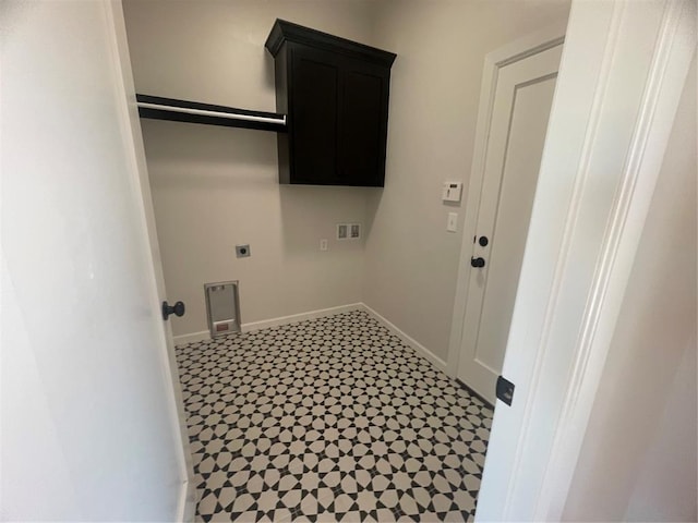 5012 Misty Wood Ln, Mustang, OK 73064 - washroom with hookup for an electric dryer, tile patterned floors, and cabinet space