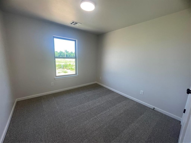 5012 Misty Wood Ln, Mustang, OK 73064 - empty room with dark colored carpet