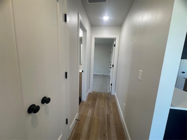 5012 Misty Wood Ln, Mustang, OK 73064 - hall with baseboards and wood finished floors