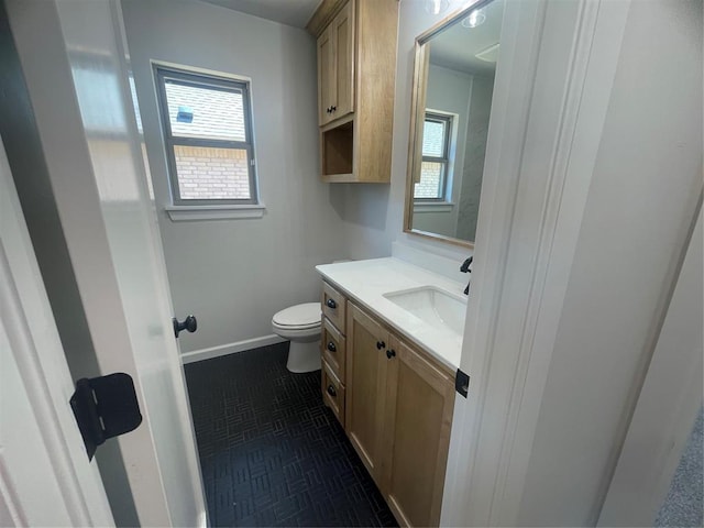 5012 Misty Wood Ln, Mustang, OK 73064 - bathroom with vanity and healthy amount of natural light