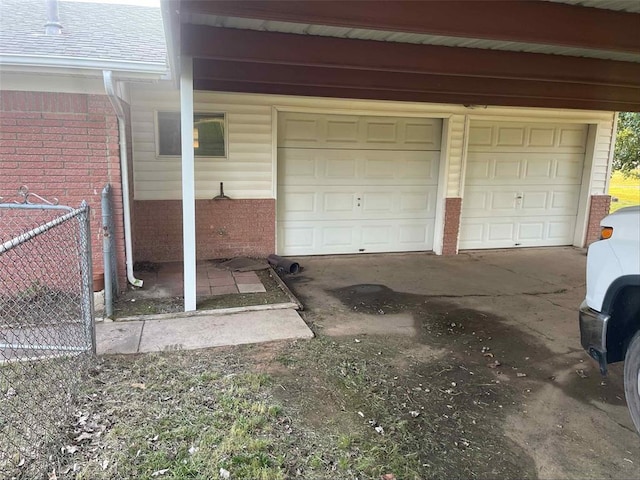 329131 E Lincoln St, Harrah, OK 73045 - garage featuring concrete driveway