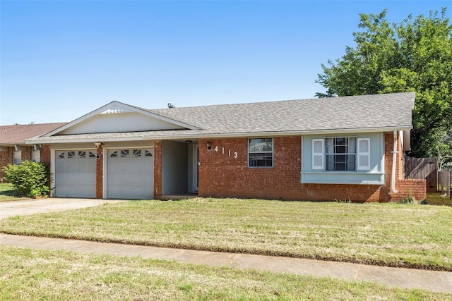 4113 Monica Dr, Del City, OK 73115 - ranch-style home with an attached garage, a front yard, driveway, a shingled roof, and brick siding