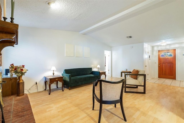 4113 Monica Dr, Del City, OK 73115 - living room featuring light wood finished floors and a textured ceiling
