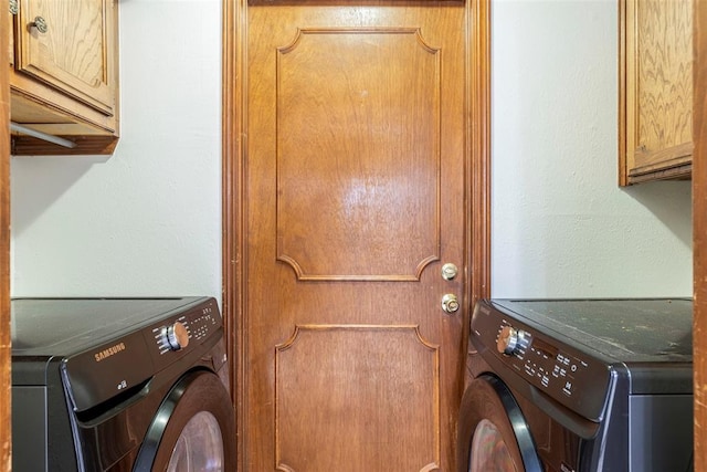 4113 Monica Dr, Del City, OK 73115 - washroom with cabinet space and washer and dryer