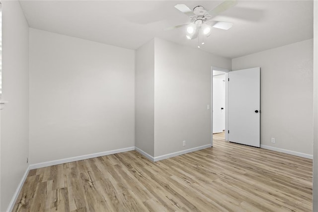empty room with light wood-type flooring, baseboards, and ceiling fan