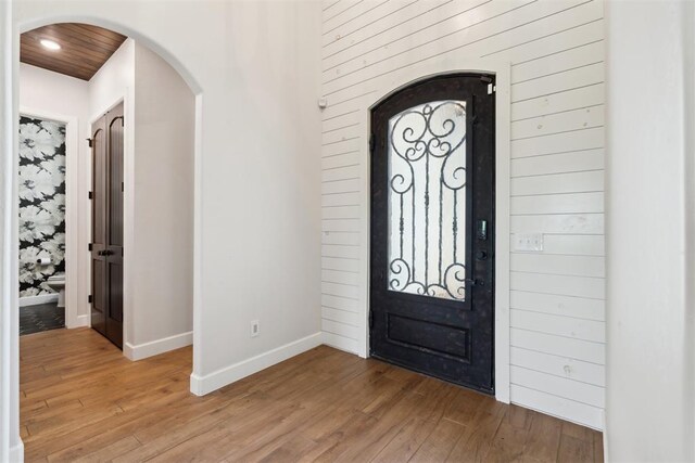 1111 Colonial Ave, Tuttle, OK 73089 - entrance foyer featuring baseboards, light wood finished floors, recessed lighting, and arched walkways