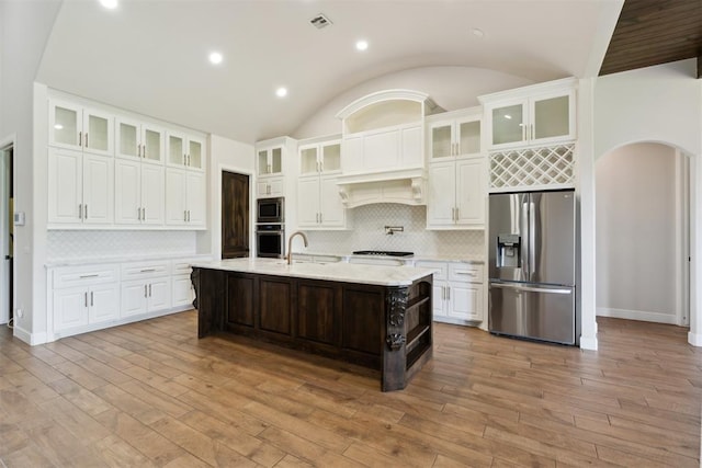 1111 Colonial Ave, Tuttle, OK 73089 - kitchen featuring stainless steel appliances, tasteful backsplash, visible vents, and a sink