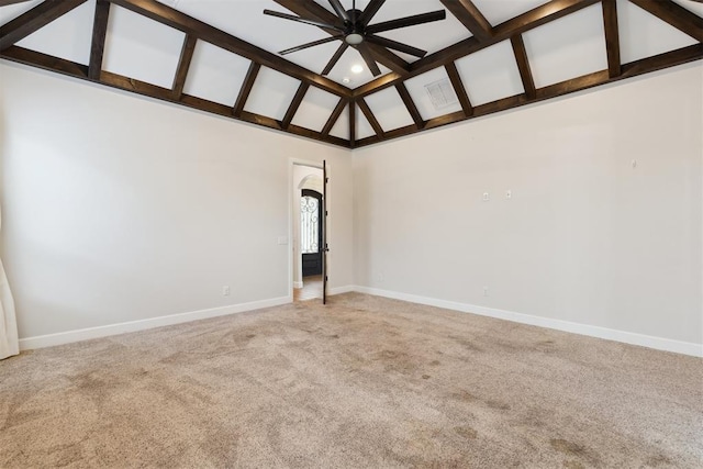 1111 Colonial Ave, Tuttle, OK 73089 - empty room with baseboards, light carpet, a ceiling fan, and vaulted ceiling