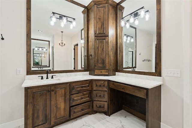 1111 Colonial Ave, Tuttle, OK 73089 - full bathroom with baseboards, marble finish floor, and vanity