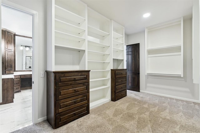 1111 Colonial Ave, Tuttle, OK 73089 - walk in closet with light carpet