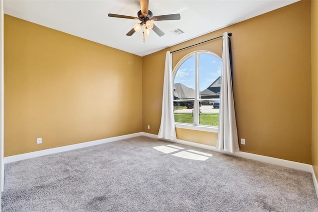 1111 Colonial Ave, Tuttle, OK 73089 - carpeted spare room with baseboards, ceiling fan, and visible vents