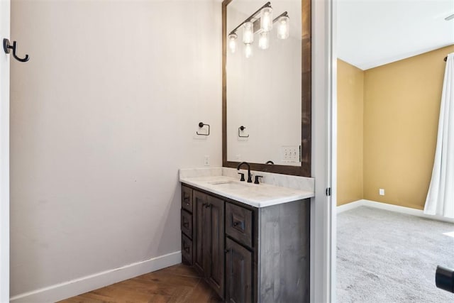 1111 Colonial Ave, Tuttle, OK 73089 - bathroom featuring baseboards and vanity