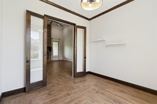 1111 Colonial Ave, Tuttle, OK 73089 - unfurnished room with baseboards, ornamental molding, and wood finished floors