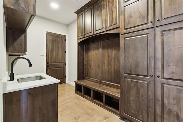 1111 Colonial Ave, Tuttle, OK 73089 - mudroom with recessed lighting, baseboards, and a sink