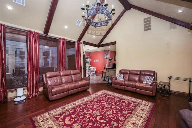 living area featuring beam ceiling, visible vents, hardwood / wood-style floors, and a notable chandelier