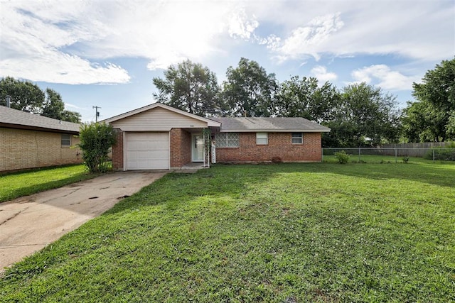 700 Redwood Dr, Noble, OK 73068 - ranch-style home with brick siding, driveway, and an attached garage