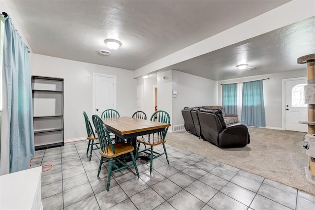 700 Redwood Dr, Noble, OK 73068 - carpeted dining room featuring tile patterned flooring