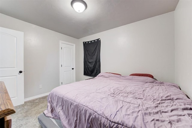 700 Redwood Dr, Noble, OK 73068 - carpeted bedroom with baseboards
