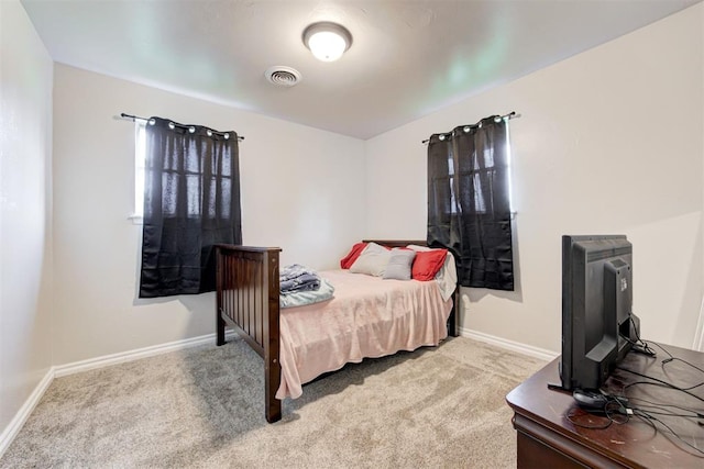 700 Redwood Dr, Noble, OK 73068 - bedroom with light colored carpet and baseboards