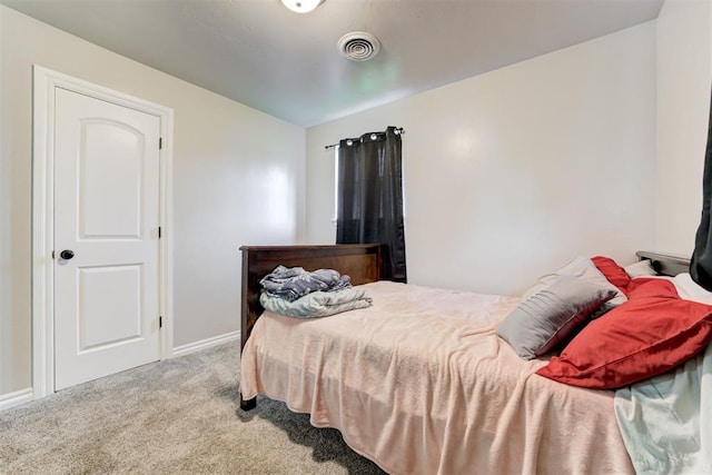 700 Redwood Dr, Noble, OK 73068 - carpeted bedroom with baseboards