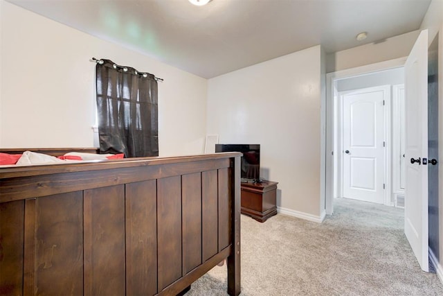 700 Redwood Dr, Noble, OK 73068 - bedroom featuring light carpet and baseboards