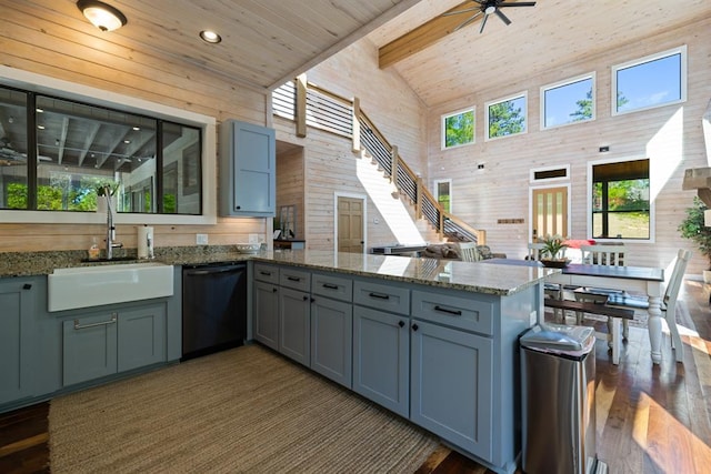 kitchen with a sink, a peninsula, black dishwasher, wooden ceiling, and a ceiling fan
