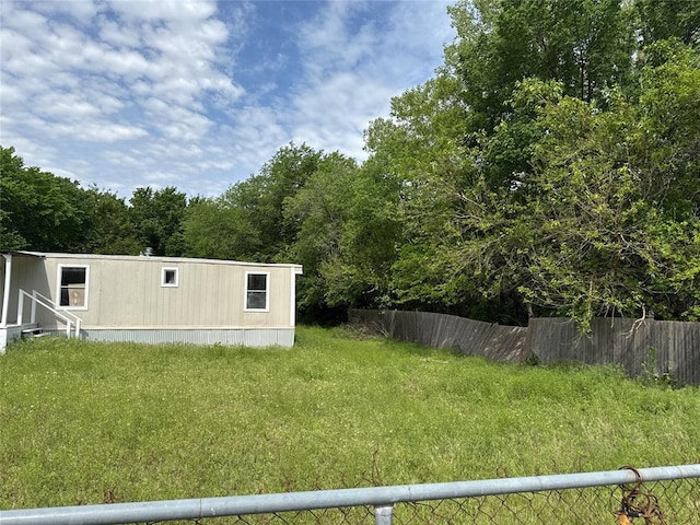 view of yard featuring fence