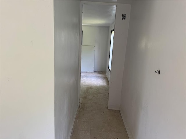 corridor with baseboards
