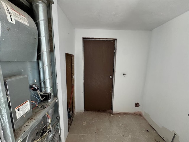 washroom featuring heating unit
