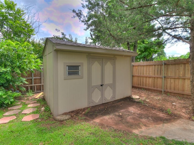 904 Carfax Rd, Edmond, OK 73034 - view of shed featuring a fenced backyard