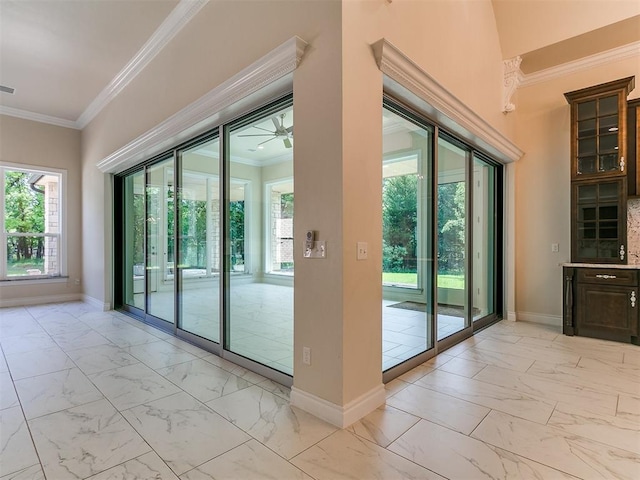 6209 Lakewood Ridge Rd, Edmond, OK 73013 - spare room featuring light marble finish floors, crown molding, and ceiling fan