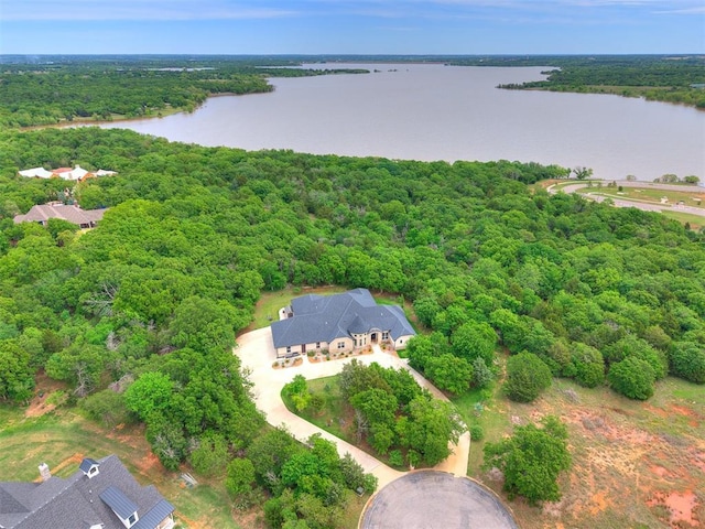 6209 Lakewood Ridge Rd, Edmond, OK 73013 - aerial view of a forest and a nearby body of water