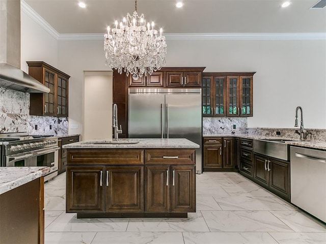 6209 Lakewood Ridge Rd, Edmond, OK 73013 - kitchen with stainless steel appliances, extractor fan, light marble finish flooring, pendant lighting, and dark brown cabinetry