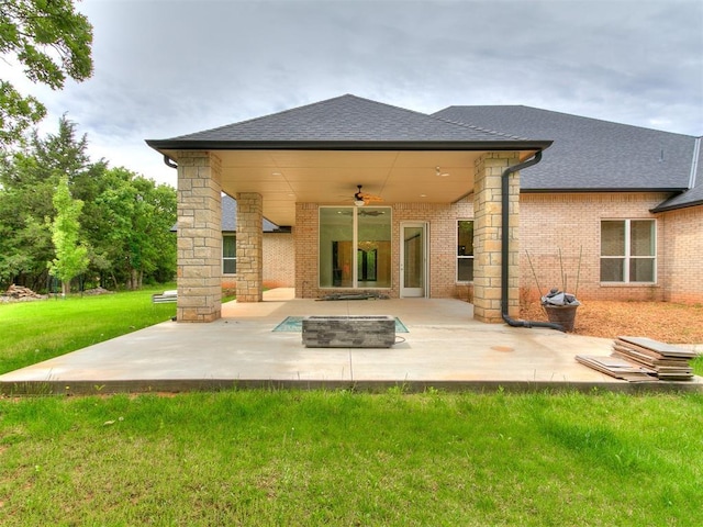6209 Lakewood Ridge Rd, Edmond, OK 73013 - back of house with ceiling fan, a patio, a lawn, and a shingled roof