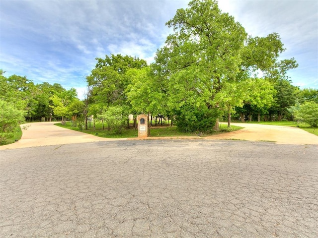 6209 Lakewood Ridge Rd, Edmond, OK 73013 - view of street featuring view of scattered trees