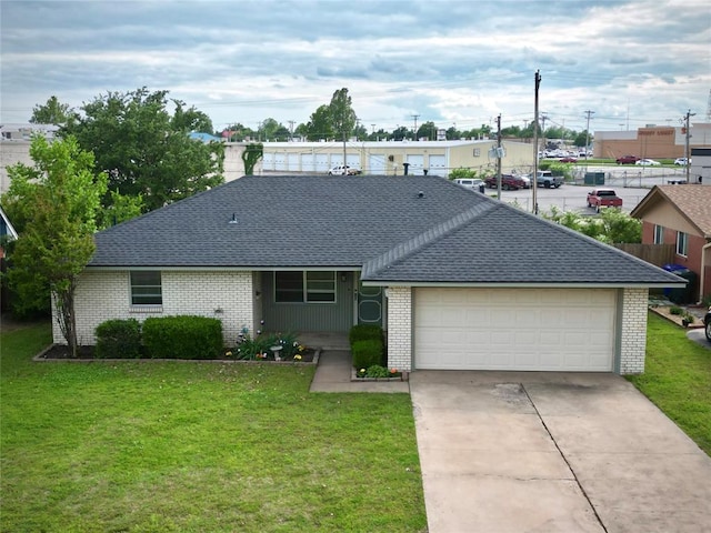 view of front facade with brick siding, roof with shingles, a garage, and concrete driveway