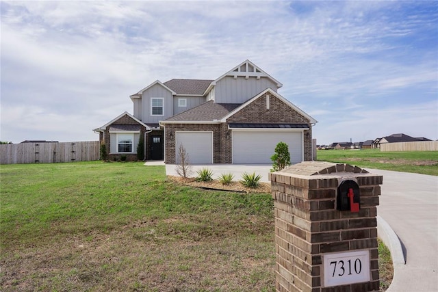 7310 S Brookwater Way, Stillwater, OK 74074 - craftsman house with driveway, brick siding, fence, an attached garage, and a front lawn